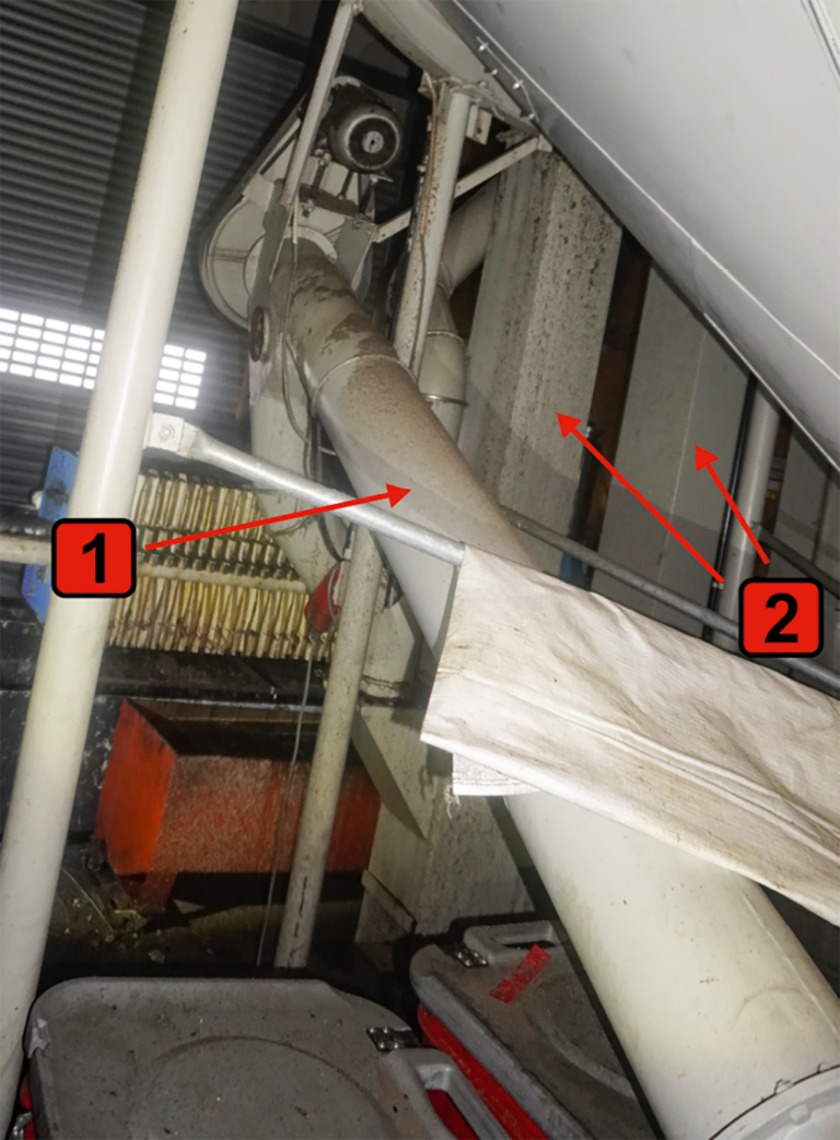  Bild 4 / Förderschnecke (Pfeil 1) vom Zwischensilo zum Elevator (Pfeile 2)